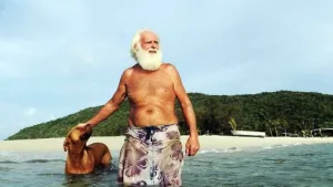 Un ciudadano británico con su perro en una isla