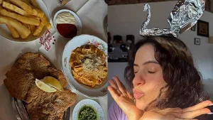 Rosalía fue a comer al bodegón Olla 7
